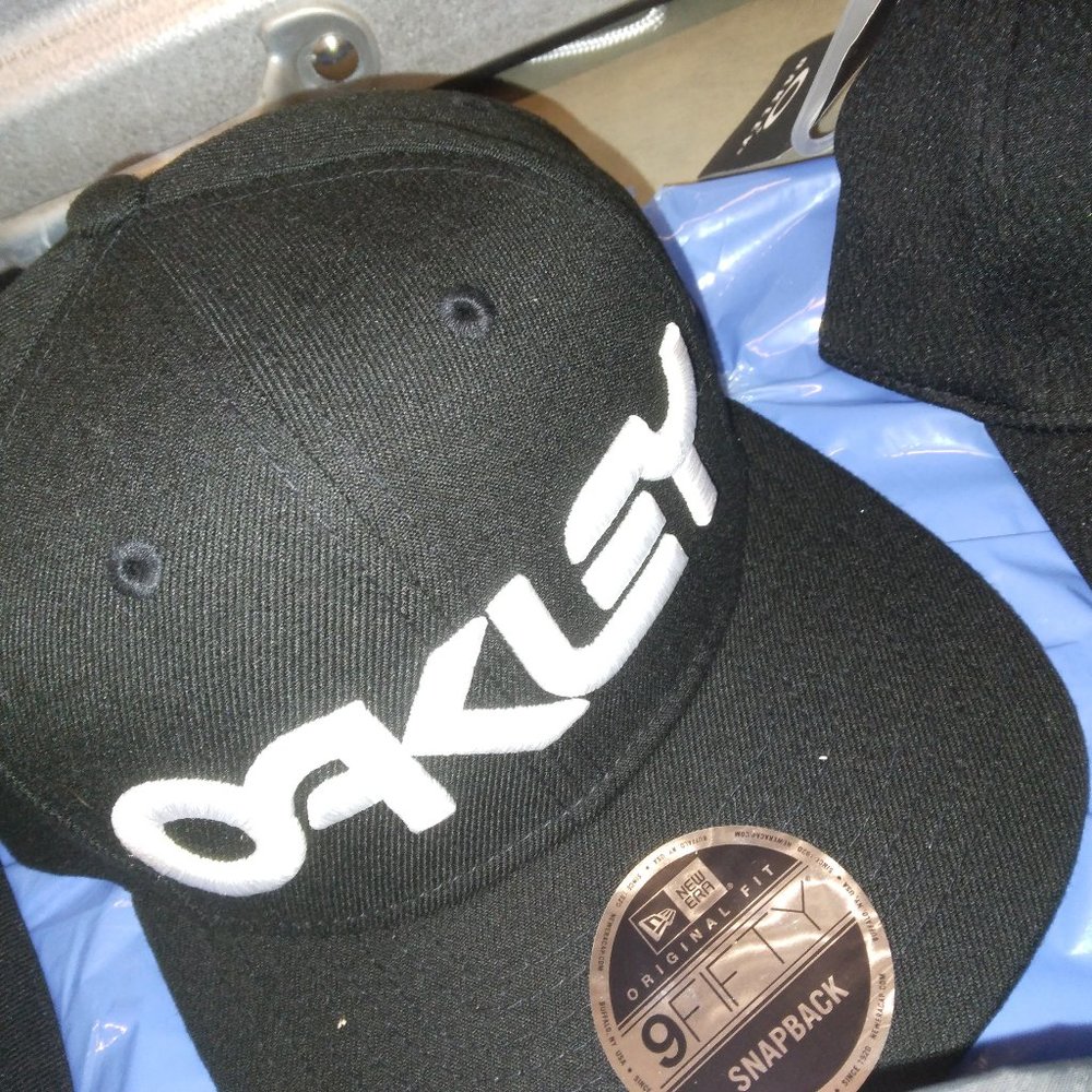 Oakley Brand Caps of different colors and styles